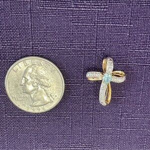 Ross-Simons gold plated 925 silver cross with blue topaz colored center stone